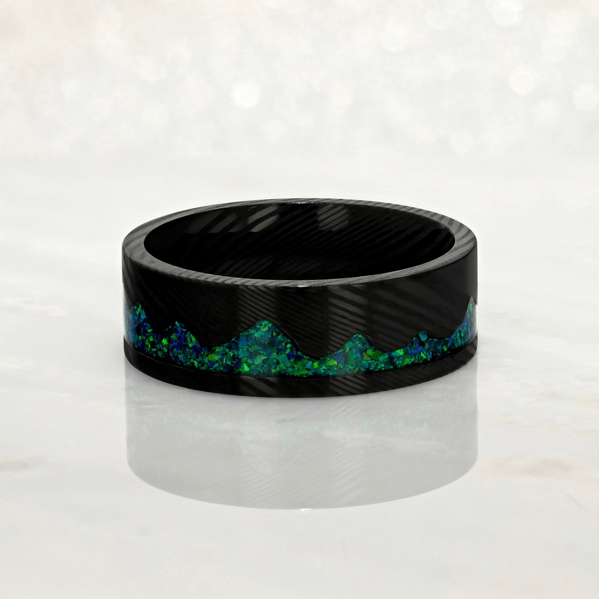 “ARTISAN” Damascus Steel Black Ring 8mm w/Green Opal Mountain Carving